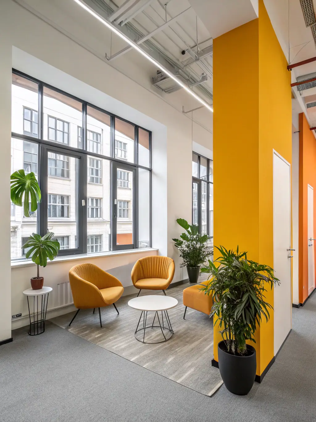 A modern office space with freshly painted walls in neutral tones, highlighting a commercial painting project by BWD Painting, emphasizing the professional and clean look achieved.