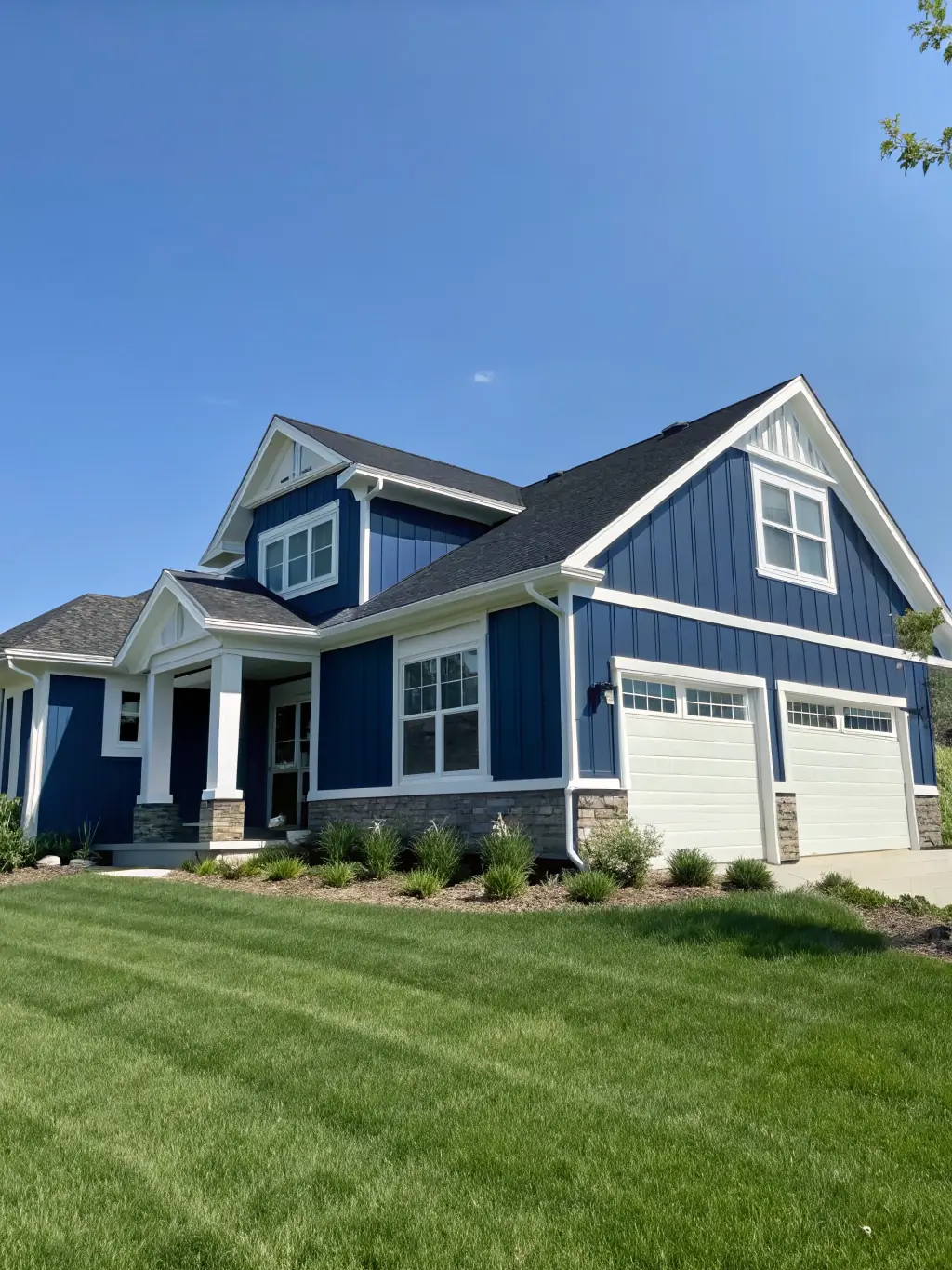 A house with a freshly painted exterior, highlighting the durability and aesthetic appeal of BWD Painting's exterior painting services.